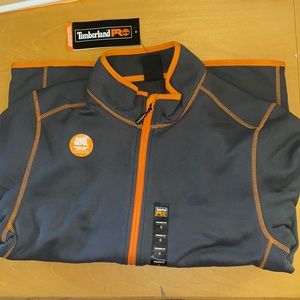 Man’s small timblerland grey and orange rain repellent light sweater, never worn